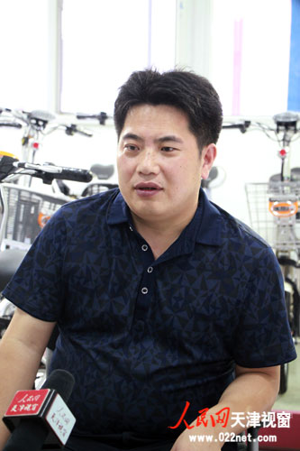 采訪天津市美麗行鋰電車科技有限公司總經理張亞軍。